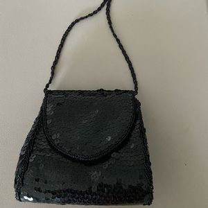 Purse-evening style-black sequined.from 1970’s